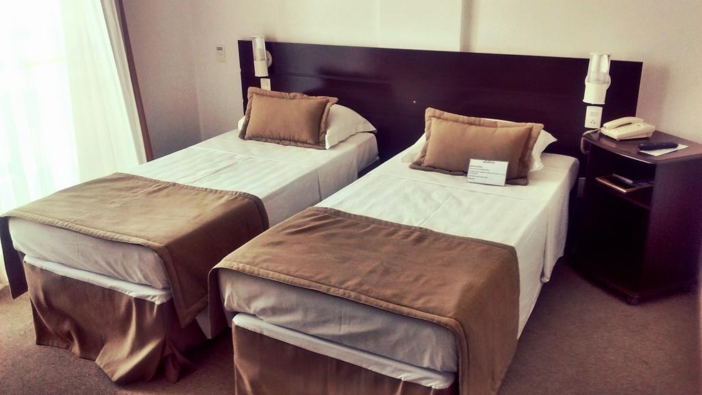Podium Apart Hotel Varginha  Phòng bức ảnh