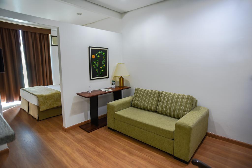 Podium Apart Hotel Varginha  Phòng bức ảnh